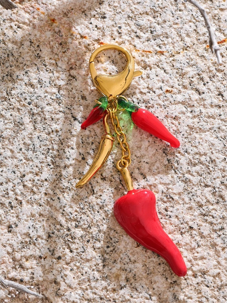 Red enamel resin chilli handbag keychain pendant - product image