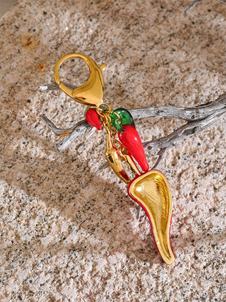 Red enamel resin chilli handbag keychain pendant - product image