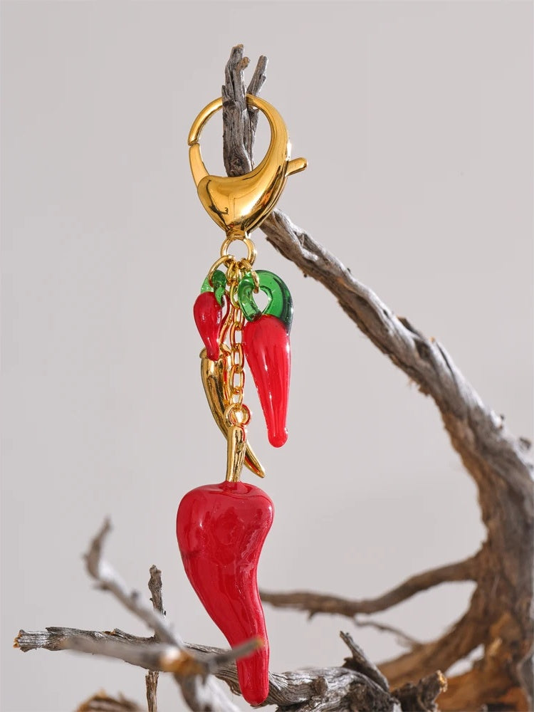 Red enamel resin chilli handbag keychain pendant - product image