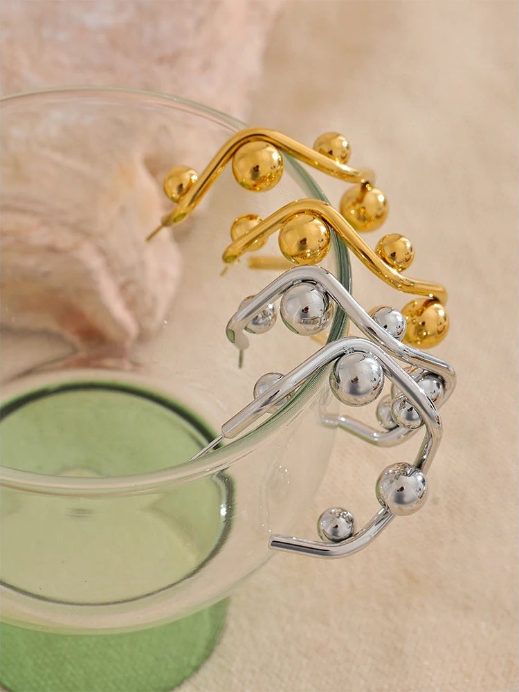 Round beads c-shape huggie hoop earrings - product image