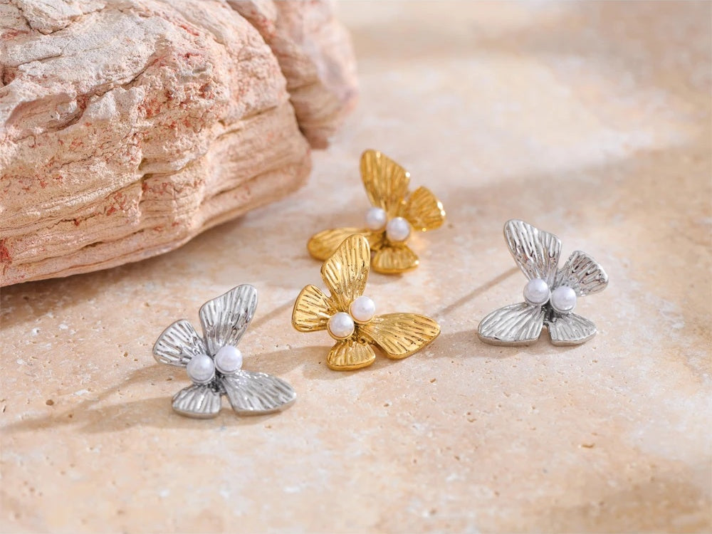 Simulated pearl butterfly push-back stud earrings - product image