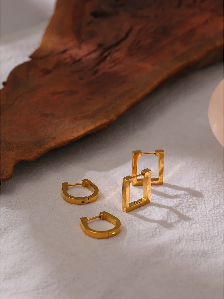 Square golden statement metal hoop earrings - product image