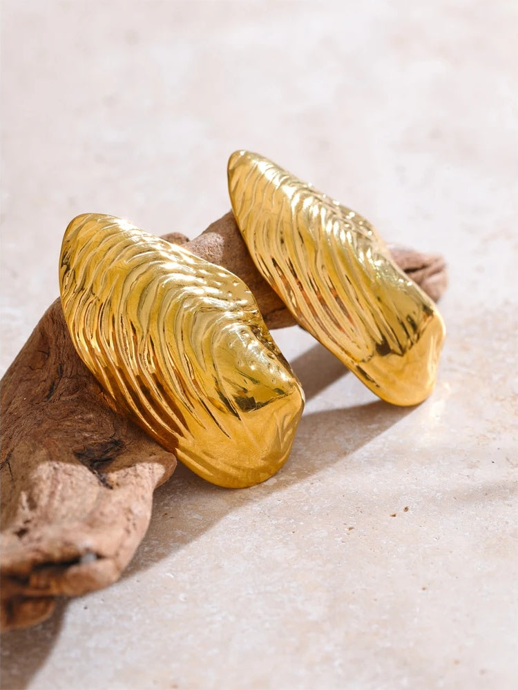 Statement gold color big stud earrings - product image