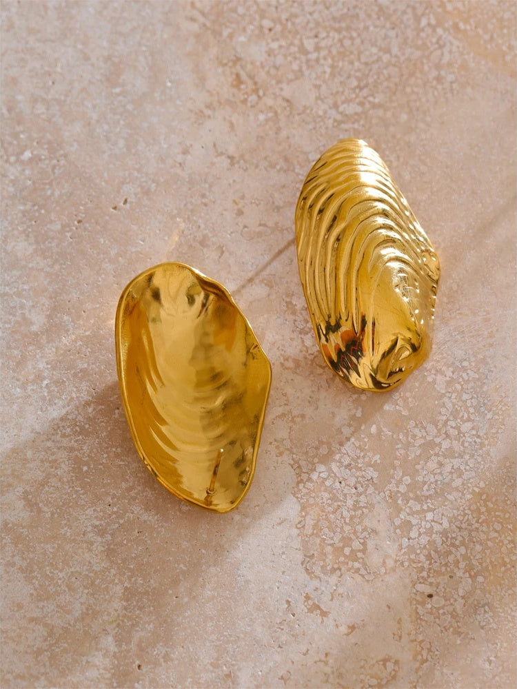 Statement gold color big stud earrings - product image