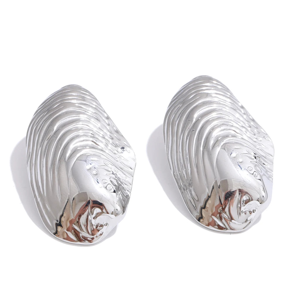 Statement gold color big stud earrings - product image