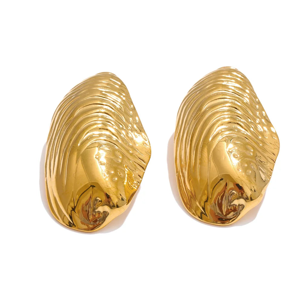 Statement gold color big stud earrings - product image