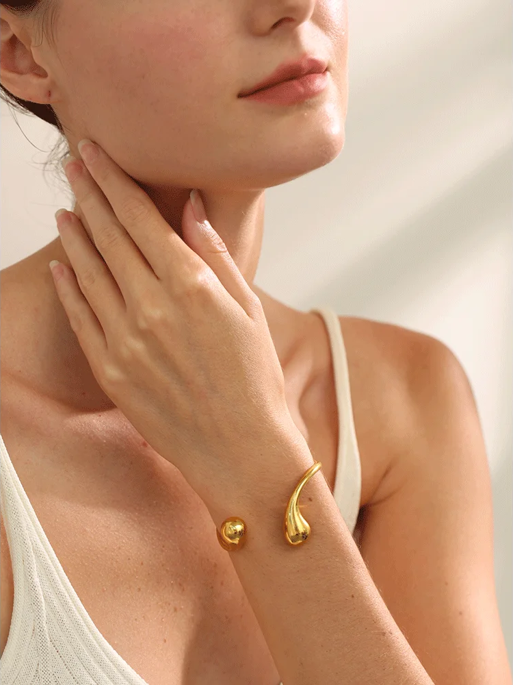 Twisted cuff open minimalist charm bracelet - product image