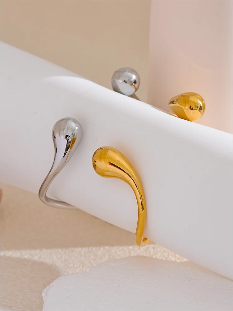 Twisted cuff open minimalist charm bracelet - product image