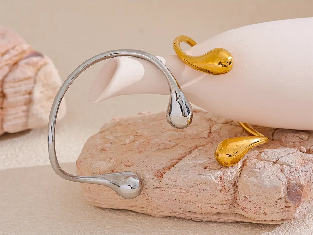 Twisted cuff open minimalist charm bracelet - product image