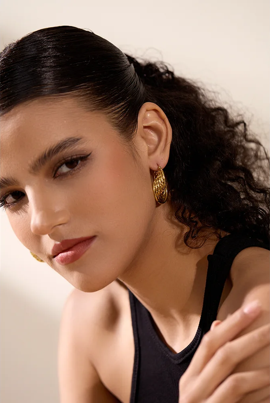 Twisted hollow hoop contemporary statement earrings - product image