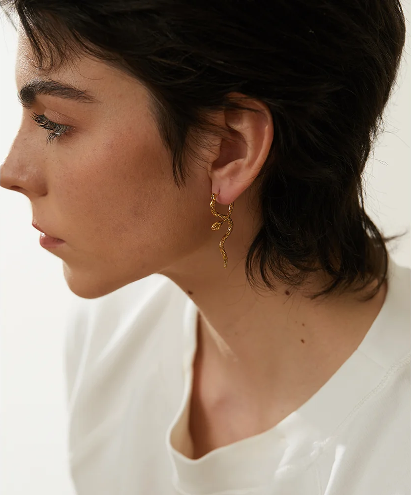 Unique snake textured hoop statement earrings - product image