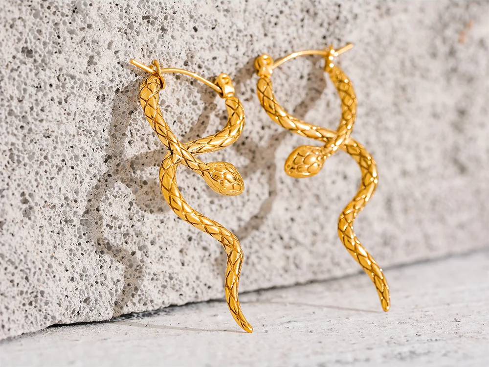 Unique snake textured hoop statement earrings - product image
