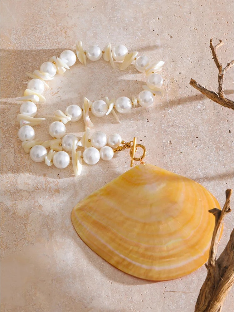 Yellow shell simulated pearl pendant necklace - product image