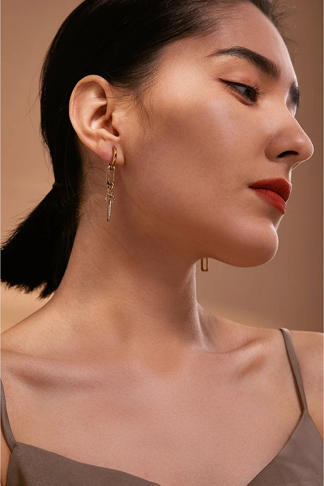 Abstract dangle long earrings gold texture - product image