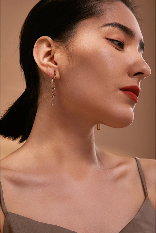Abstract dangle long earrings gold texture - product image
