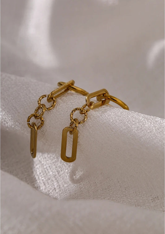 Abstract dangle long earrings gold texture - product image