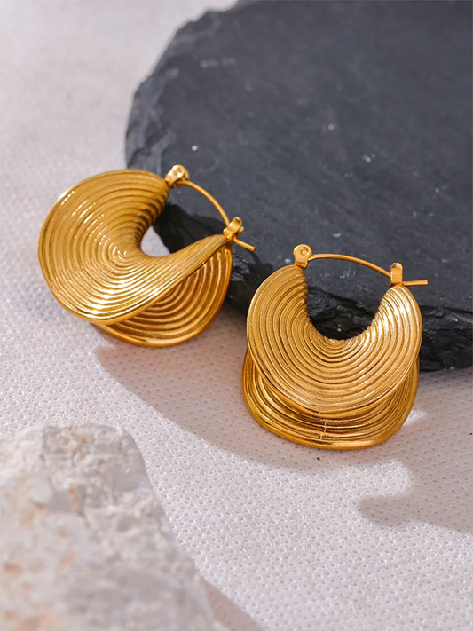 Abstract gold tone metal statement hoop earrings - product image
