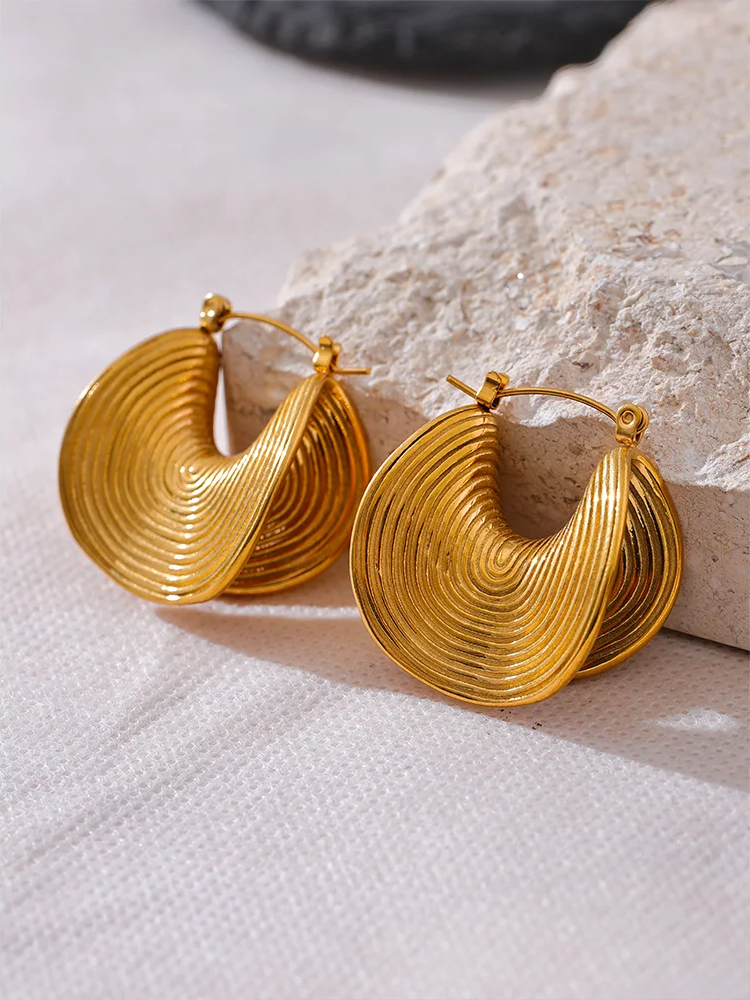 Abstract gold tone metal statement hoop earrings - product image