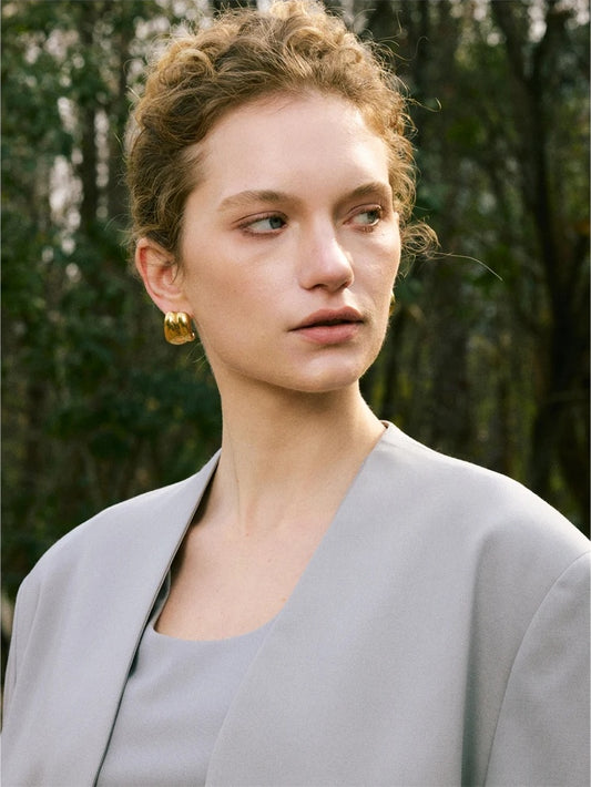 Abstract stainless steel stud earrings - product image