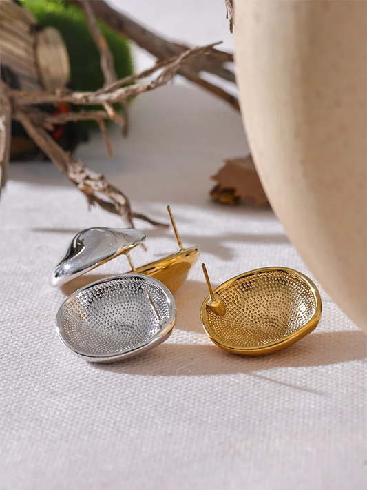 Abstract textured stainless steel stud earrings - product image