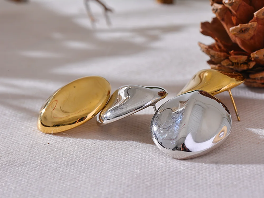Abstract textured stainless steel stud earrings - product image