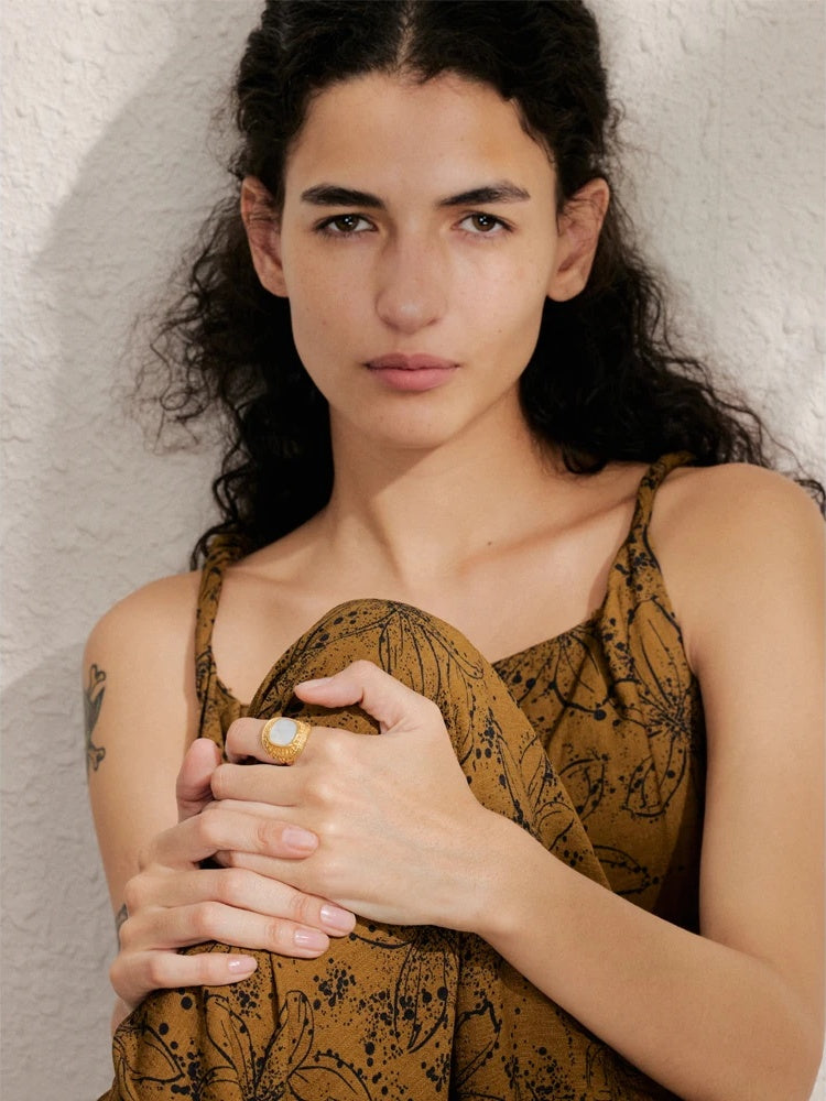 Adjustable shell abstract finger ring - product image