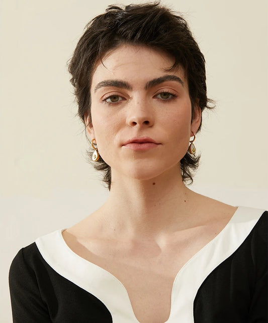 Avocado shell huggie hoop earrings - product image
