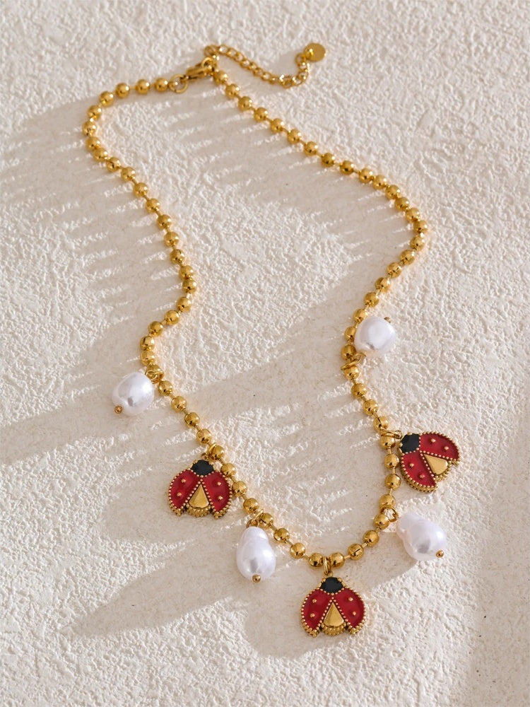 Baroque simulated pearls ladybird pendant necklace - product image