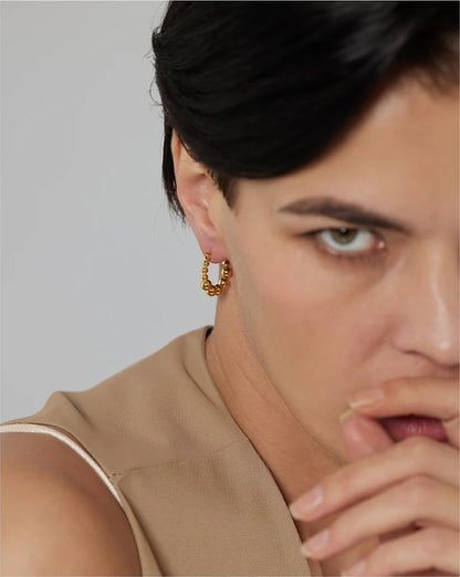 Bead round hollow simple gold color hoop earrings - product image