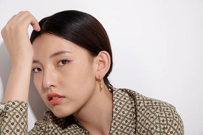 Body style metal golden hoop earrings - product image