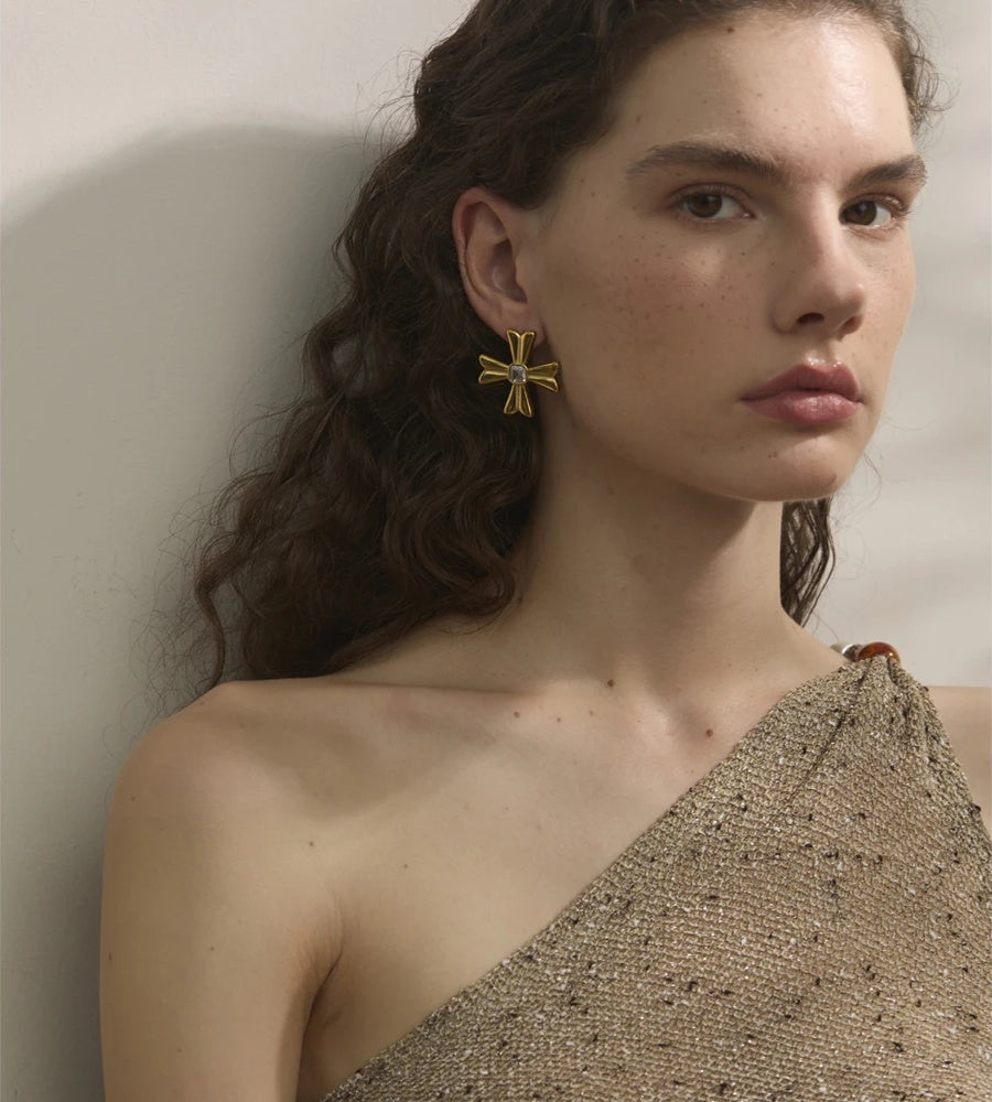 Casting cross statement rust resistant stud earrings - product image