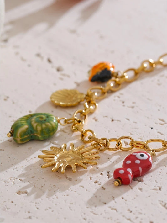 Ceramic conch fish butterfly pendant necklace - product image