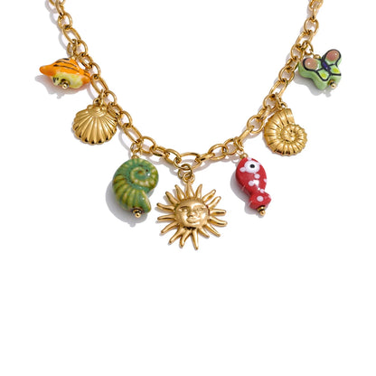 Ceramic conch fish butterfly pendant necklace - product image