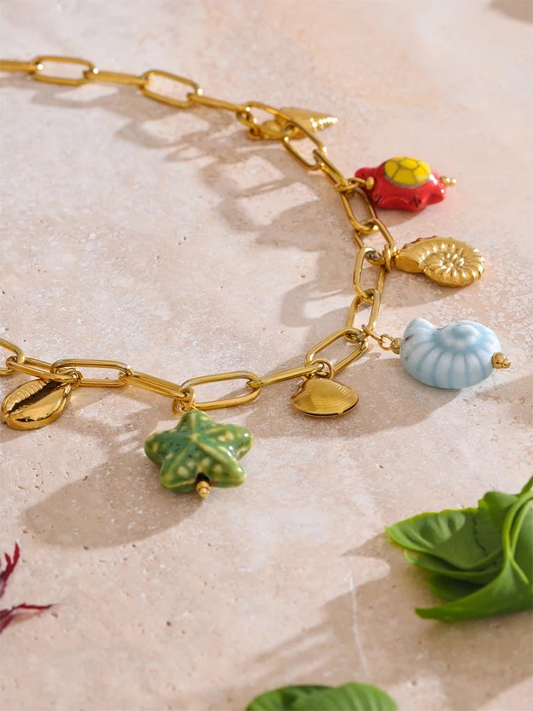 Ceramic shell starfish turtle drop pendant necklace - product image