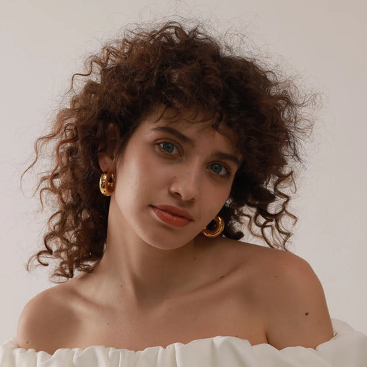Chunky minimalist contemporary hoop earrings women - product image