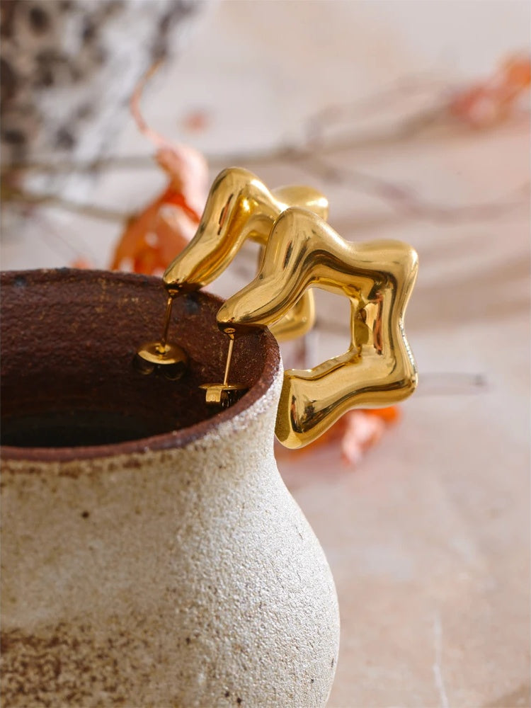 Chunky star abstract hoop earrings - product image
