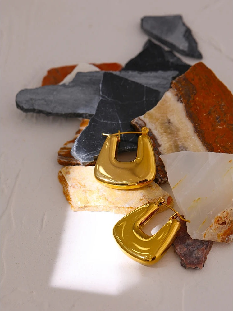 Contemporary chunky gold color statement hoop earrings - product image