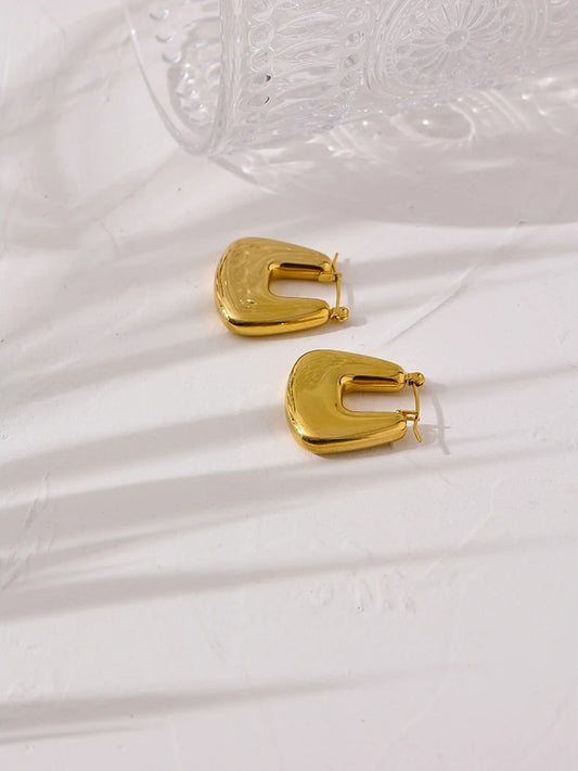 Contemporary chunky gold color statement hoop earrings - product image
