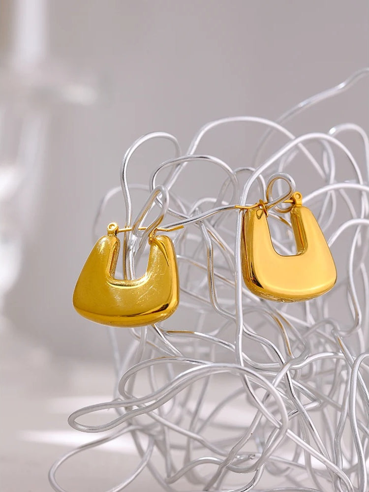 Contemporary chunky gold color statement hoop earrings - product image