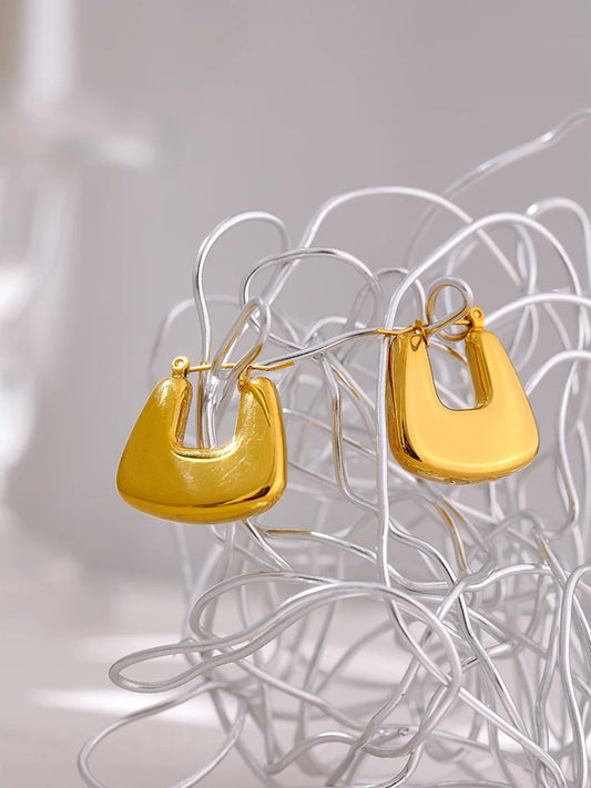 Contemporary chunky gold color statement hoop earrings - product image