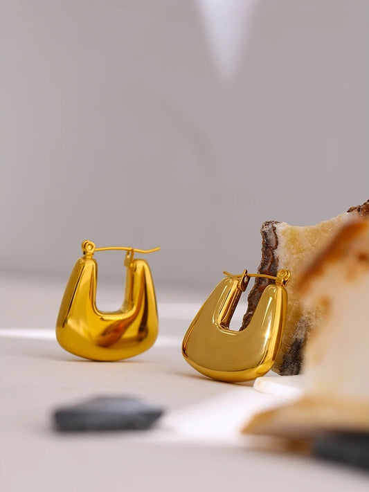 Contemporary chunky gold color statement hoop earrings - product image