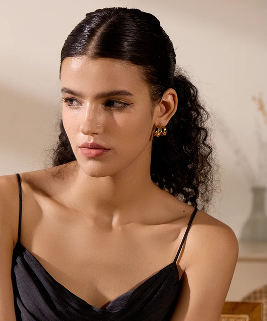 Contemporary unusual huggie metal texture earrings - product image