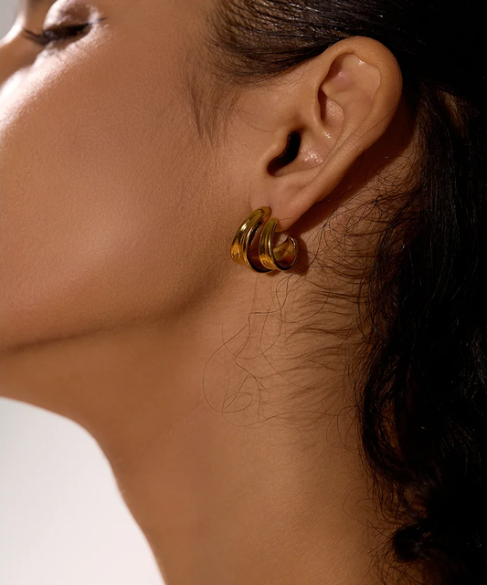 Contemporary unusual huggie metal texture earrings - product image