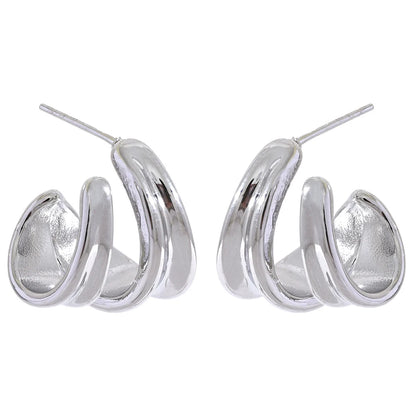 Contemporary unusual huggie metal texture earrings - product image