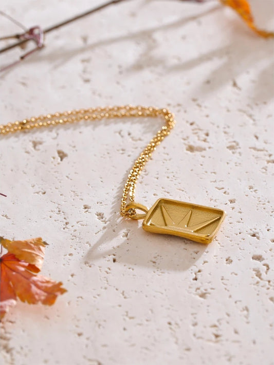 Cubic zirconia sun charm pendant necklace - product image