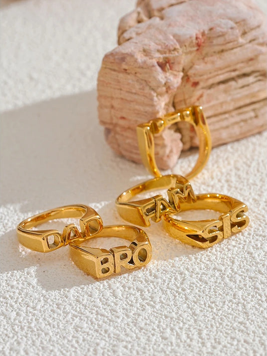 Family letter cast texture gold color statement ring - product image