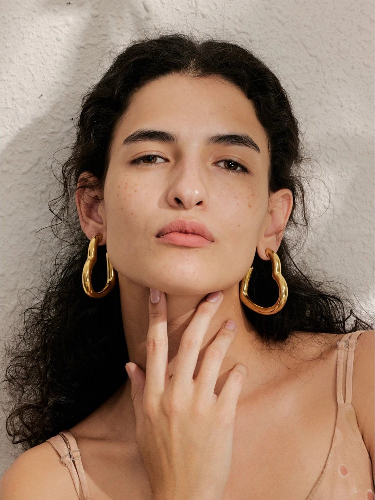 Glossy heart hollow hoop earrings - product image