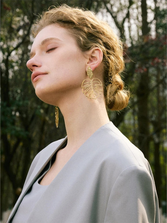 Gold color leaf hollow drop earrings women - product image