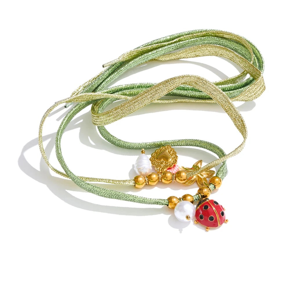 Green rope pearl ladybird heart charm - product image