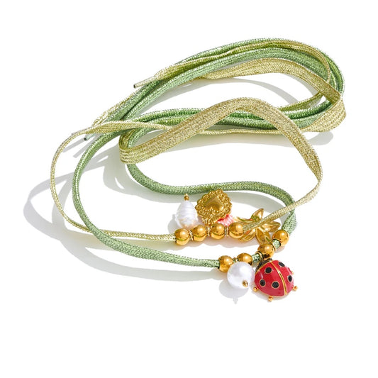 Green rope pearl ladybird heart charm - product image
